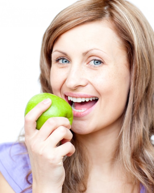 Beautiful woman holding an apple 