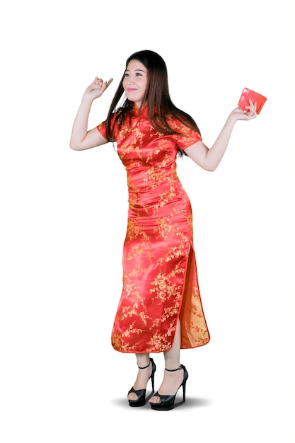 Beautiful woman holding her angpao cheerfully