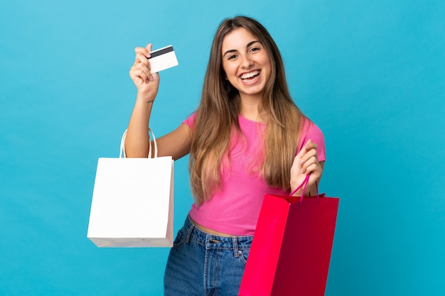 Beautiful woman holding shopping bags