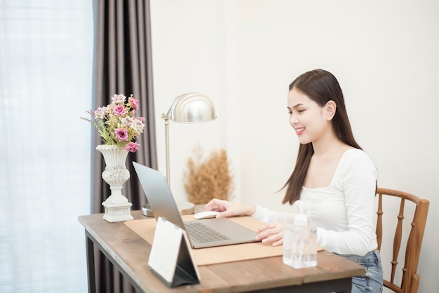 Beautiful woman is working from home