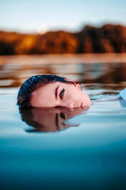 Beautiful woman in the lake