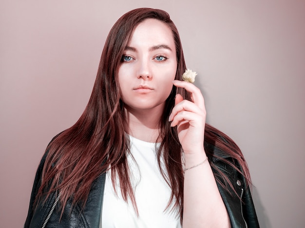 Beautiful woman in a leather jacket