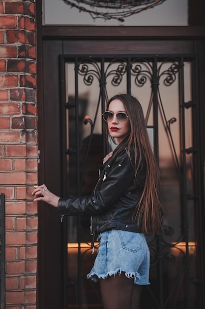 Beautiful woman in leather jacket