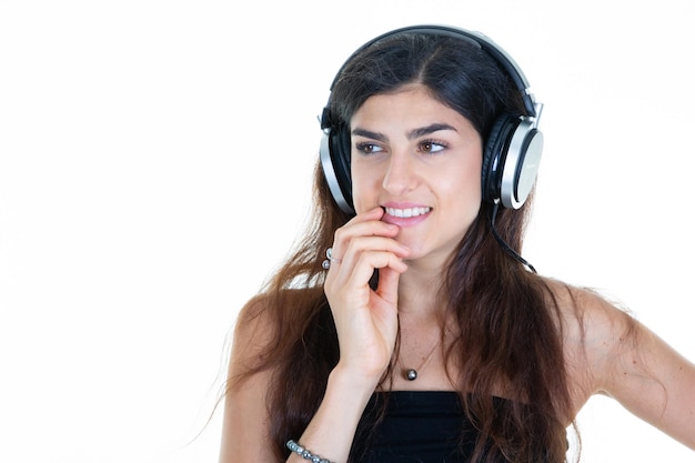 Beautiful woman listening to music with her headphones