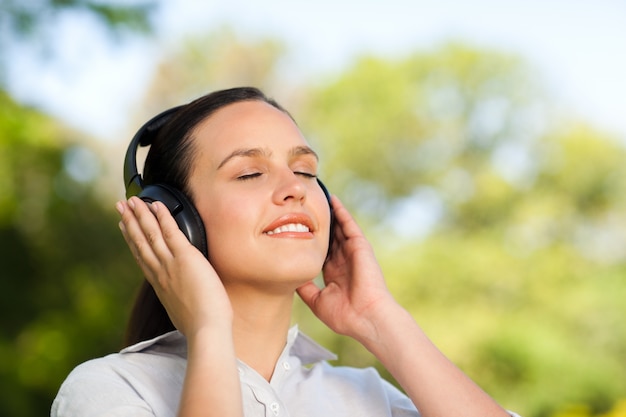 Beautiful woman listening to music