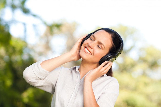 Beautiful woman listening to music