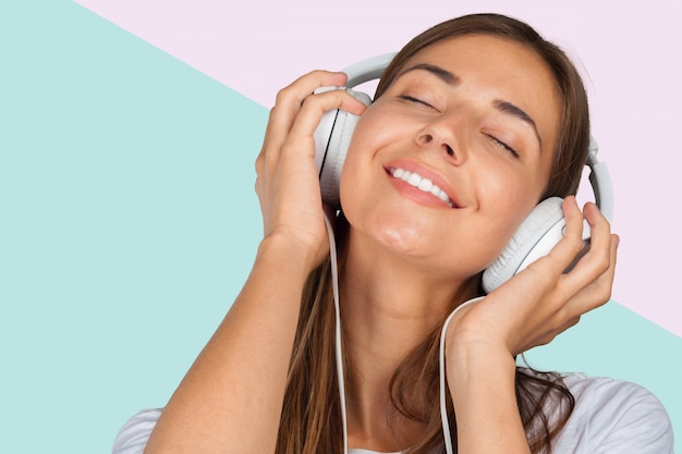 beautiful woman listening to music