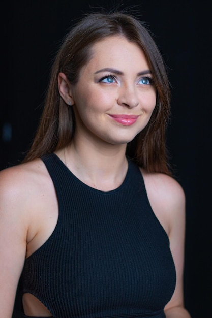 Beautiful woman portrait. Portrait Beautiful woman on black background. Womanl with Blue eyes