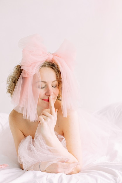 Beautiful woman posing in pastel background