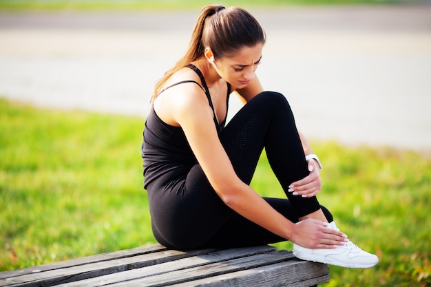 Beautiful woman practicing fitness outdoors