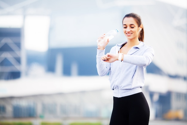 Beautiful woman practicing fitness outdoors