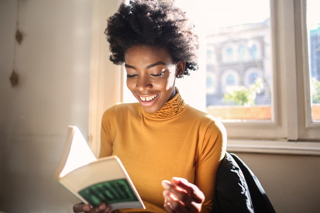 Beautiful woman reading a book