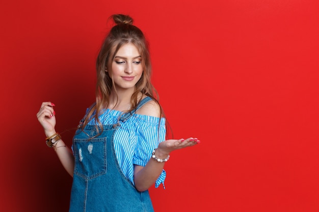 Beautiful woman on red