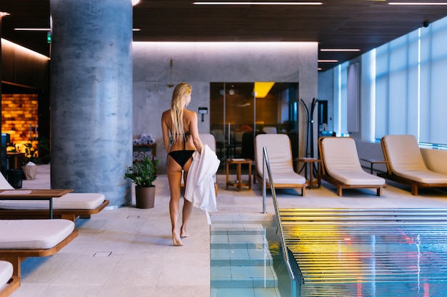 Beautiful woman relaxing in a beauty spa hotel - Client having a beauty treatment in a beauty spa salon