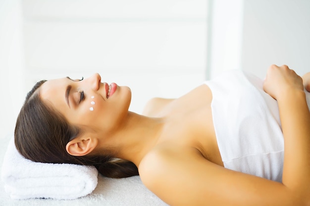 Beautiful woman relaxing in spa