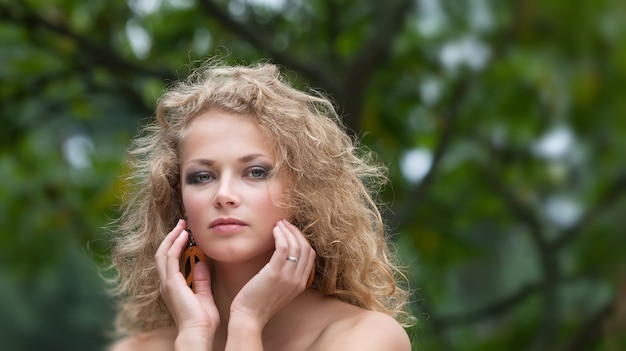 Beautiful woman resting in the garden