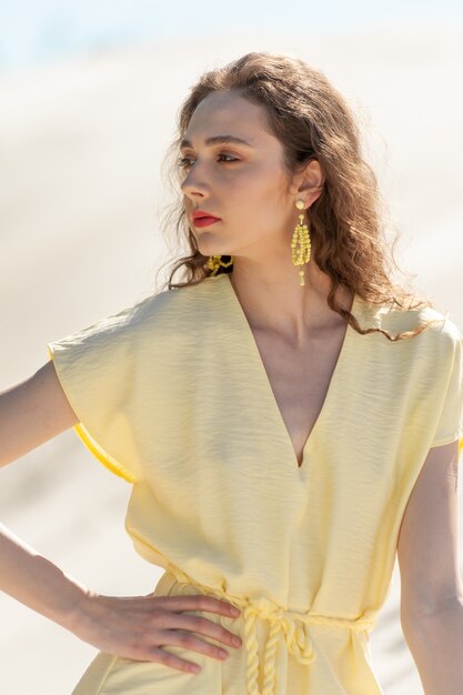 Beautiful woman on the sandy beach