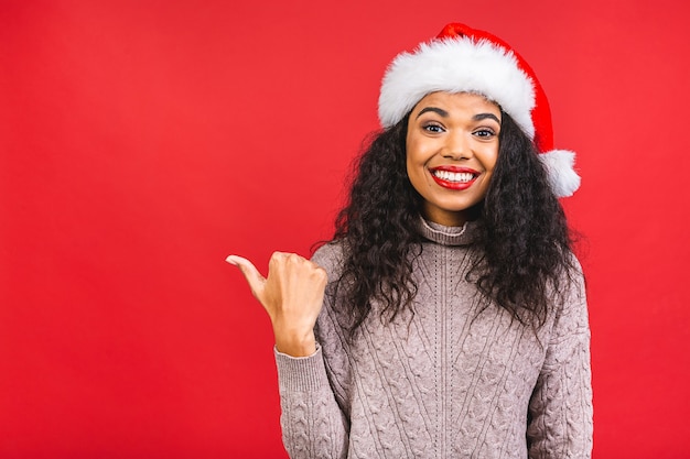 Beautiful woman in Santa Claus hat