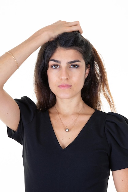 Beautiful woman serious face beauty portrait posing camera shot on white background