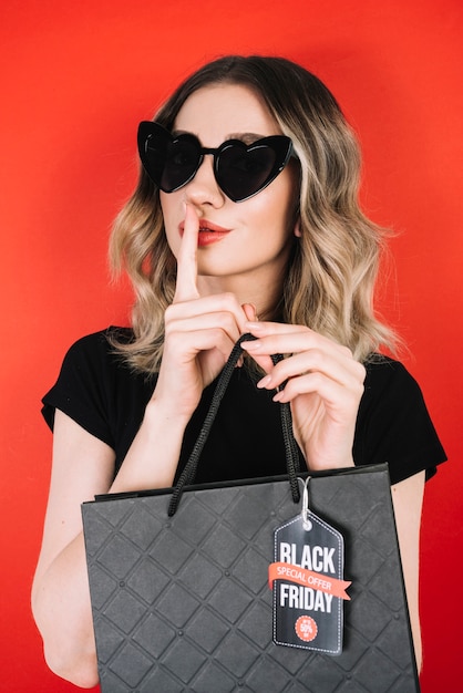 Photo beautiful woman shopping on black friday day