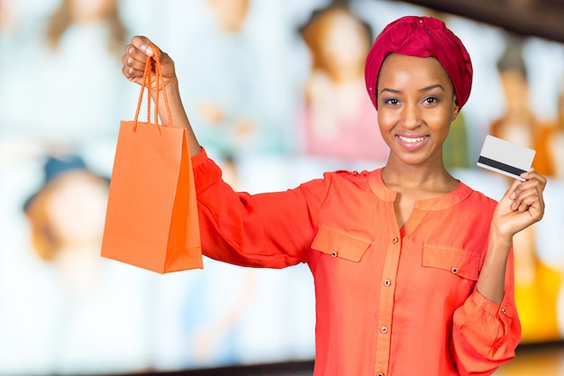 Beautiful woman shopping and holding bags