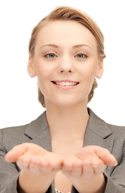 beautiful woman showing something on the palm of her hand