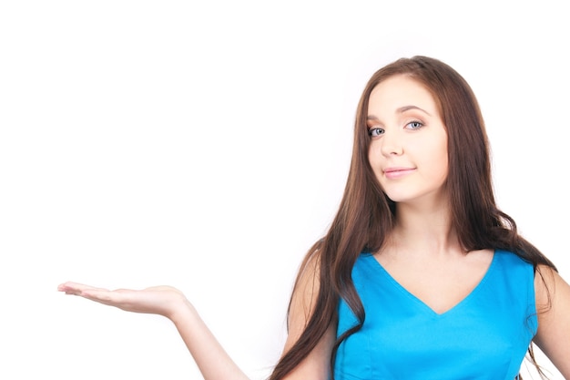 beautiful woman showing something on the palm of her hand