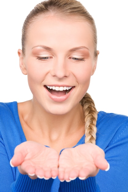 beautiful woman showing something on the palms of her hands