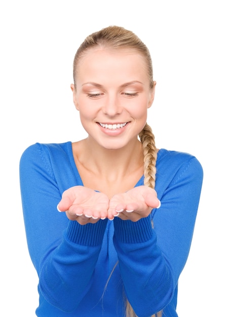 beautiful woman showing something on the palms of her hands