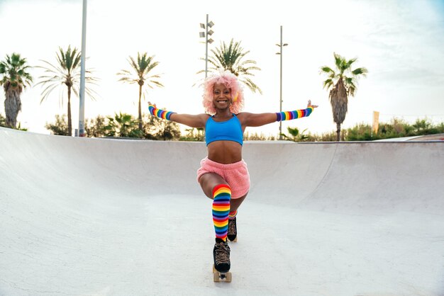 Beautiful woman skating with roller skates and having fun