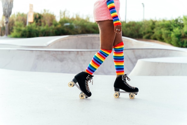 Beautiful woman skating with roller skates and having fun