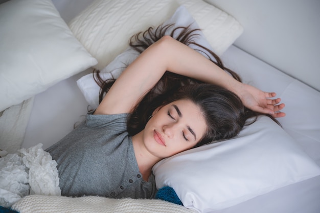 Beautiful woman sleeping on a bed