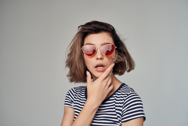 Beautiful woman in a striped Tshirt cropped view glamor