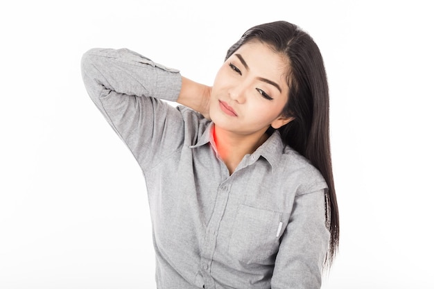 Photo beautiful woman suffering from neck pain sitting against white background