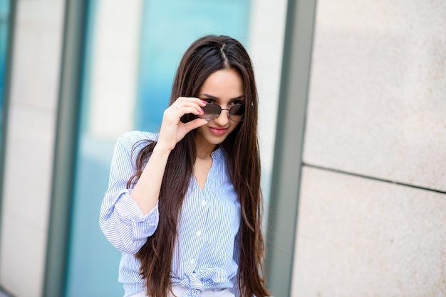 Beautiful woman in sunglasses.