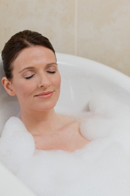 Beautiful woman taking a bath