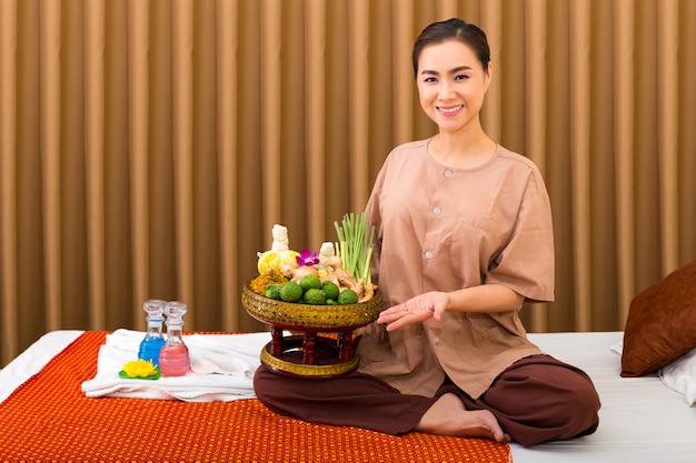 Beautiful woman in Thai massage salon