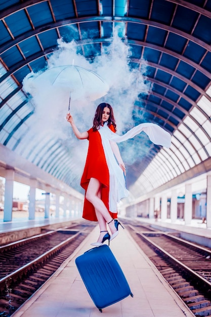 Beautiful woman at the train station