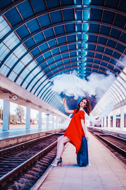 Beautiful woman at the train station