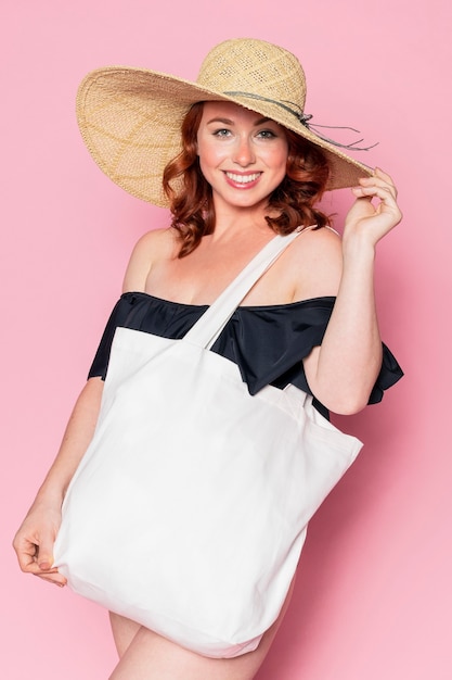 Beautiful woman using a tote bag