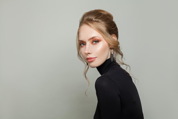 Beautiful woman wearing black turtleneck sweater