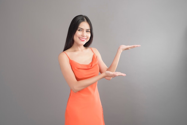 beautiful woman wearing orange dress