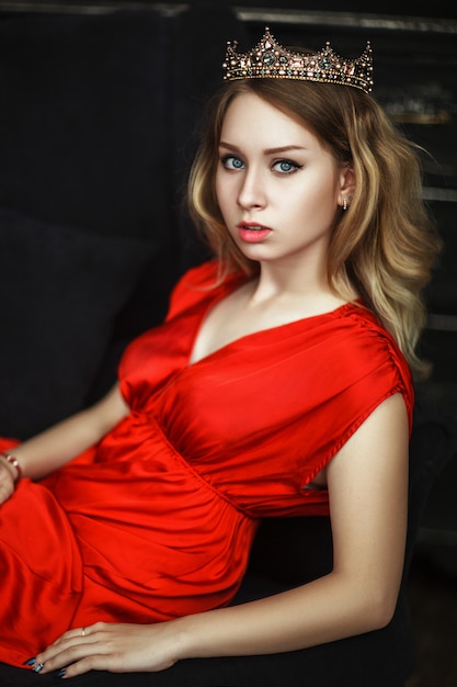 Beautiful woman wearing a red dress