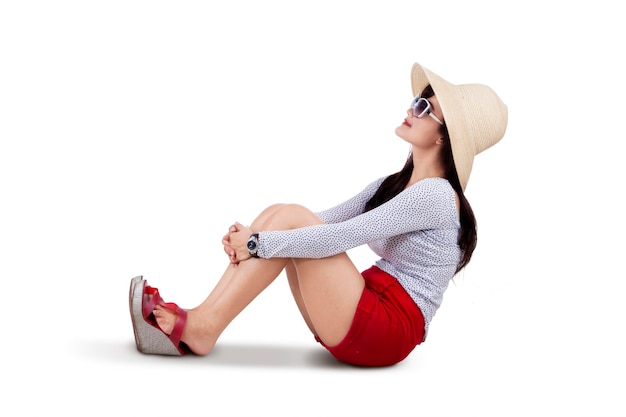 Beautiful woman wearing sun hat isolated