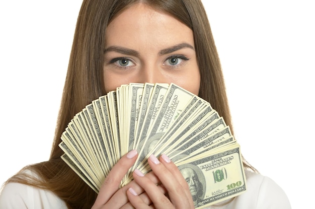 Beautiful woman in white blouse with money on white background