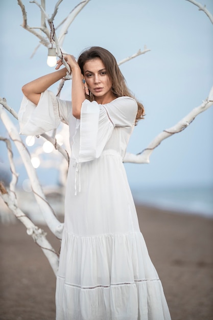 Beautiful woman in white dress