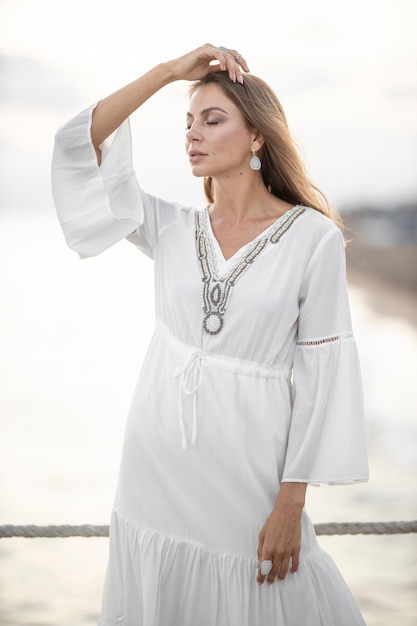 Beautiful woman in white dress