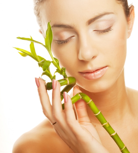 Beautiful woman with bamboo