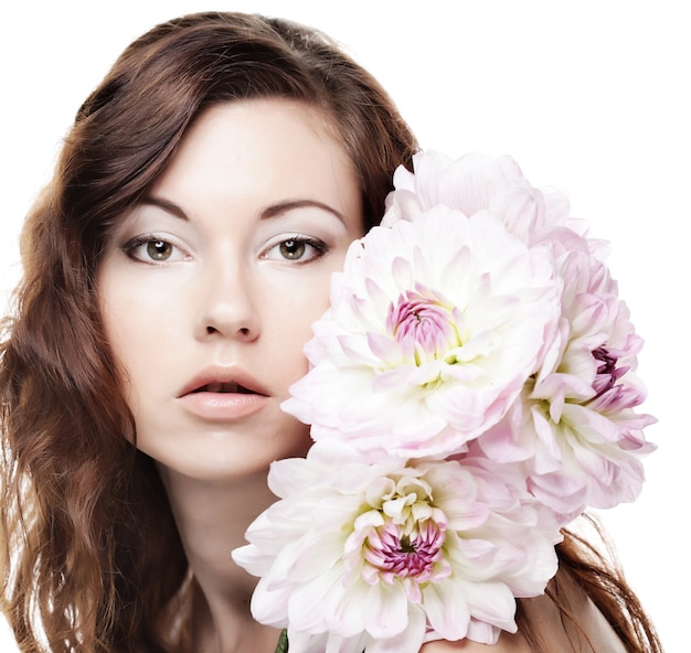 Beautiful woman with big pink flowers