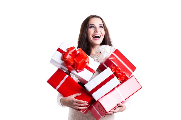 Beautiful woman with a bunch of gifts.